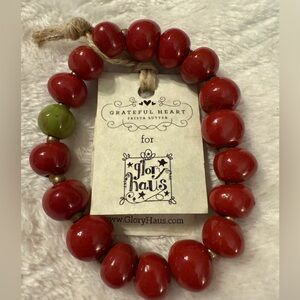 Glory Haus red and green bead bracelet